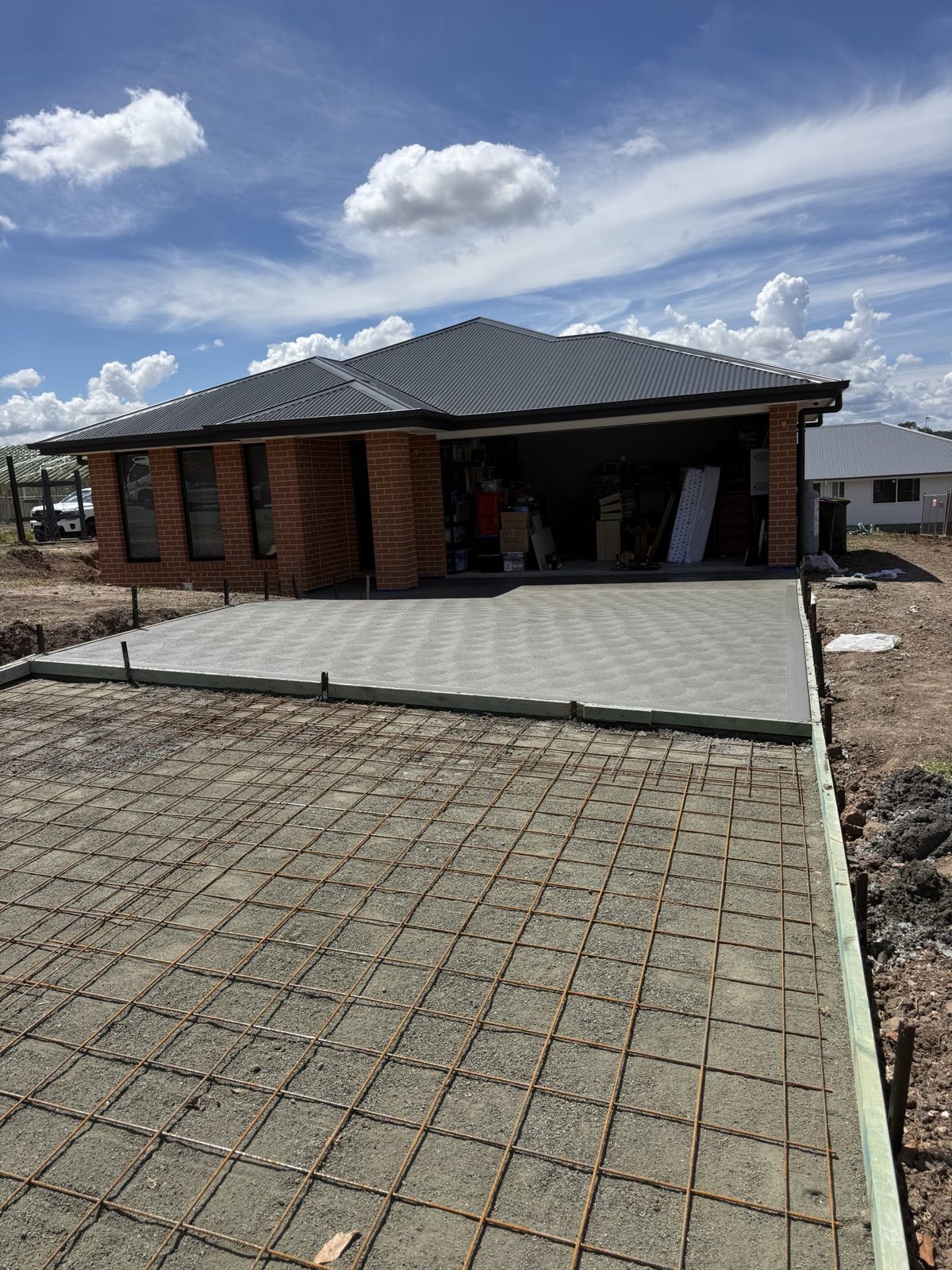 House slab with steel mesh ready for the concrete pour by EAB Concreting, Hunter Valley