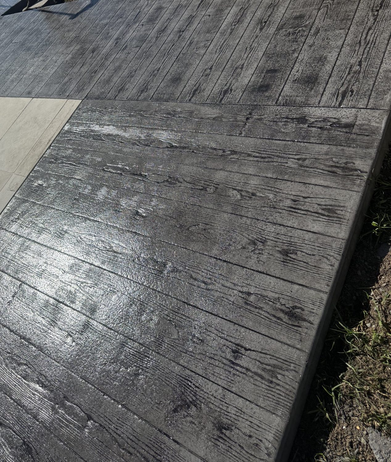 Timber-look stamped concrete outdoor entertaining area by EAB Concreting, Hunter Valley